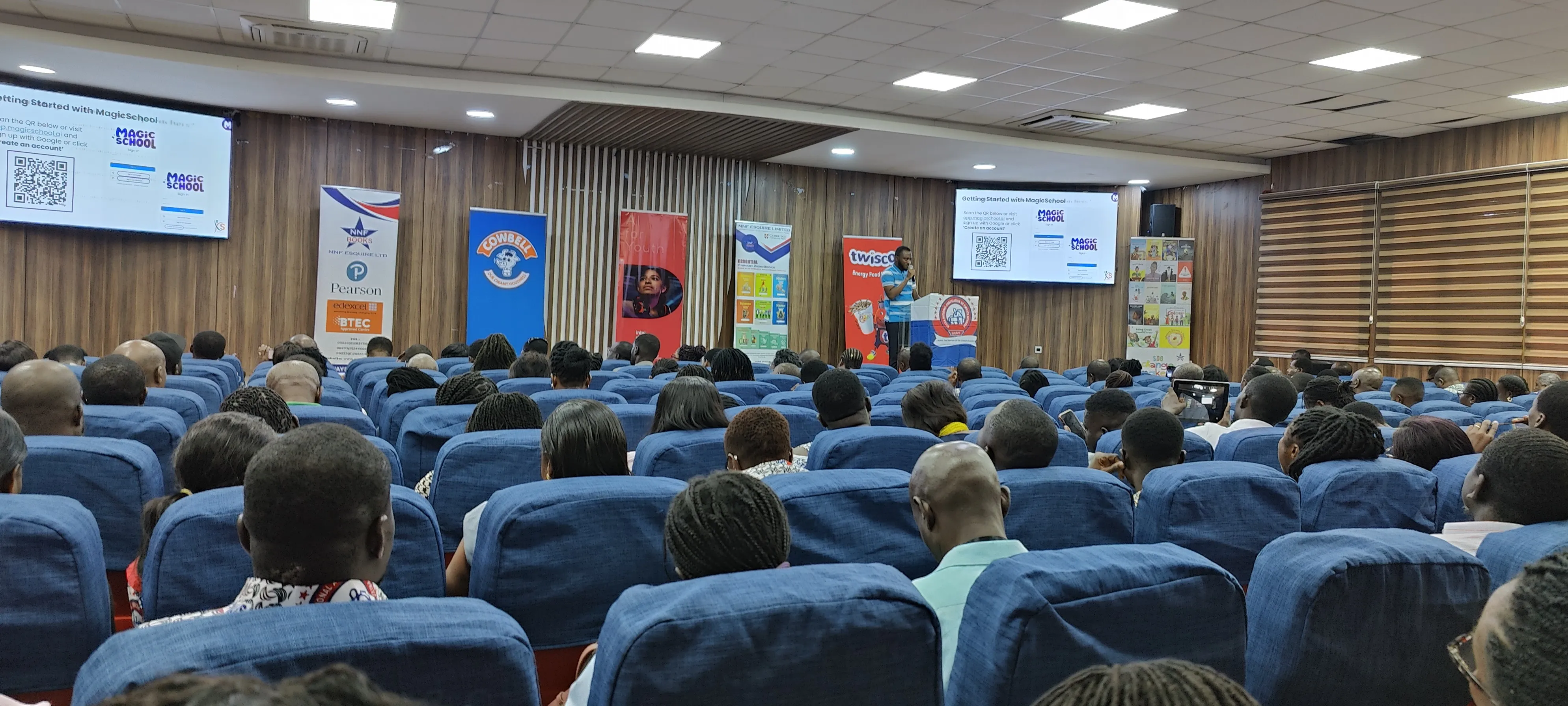 Godwin of KS Consult presenting at an AI seminar for school heads