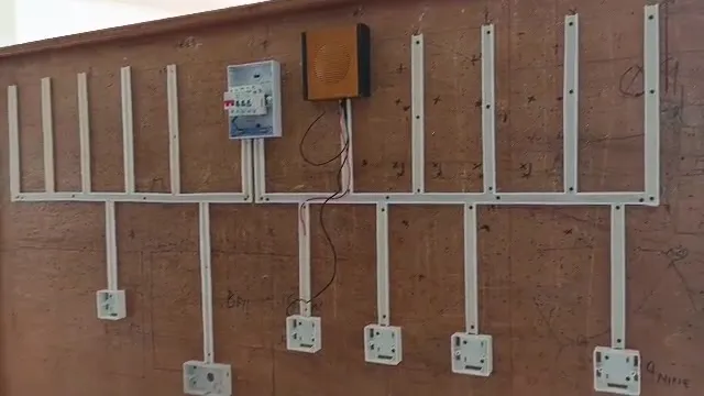 A wiring practice board with switches and sockets from the electricals class